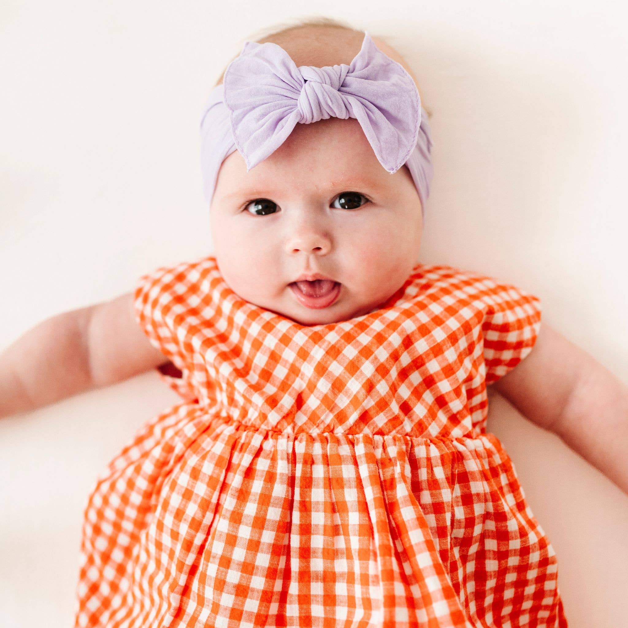 Baby Bling® The Original Knot soft nylon headband: White hair bowsBaby Bling BowsTAYLOR + MAX