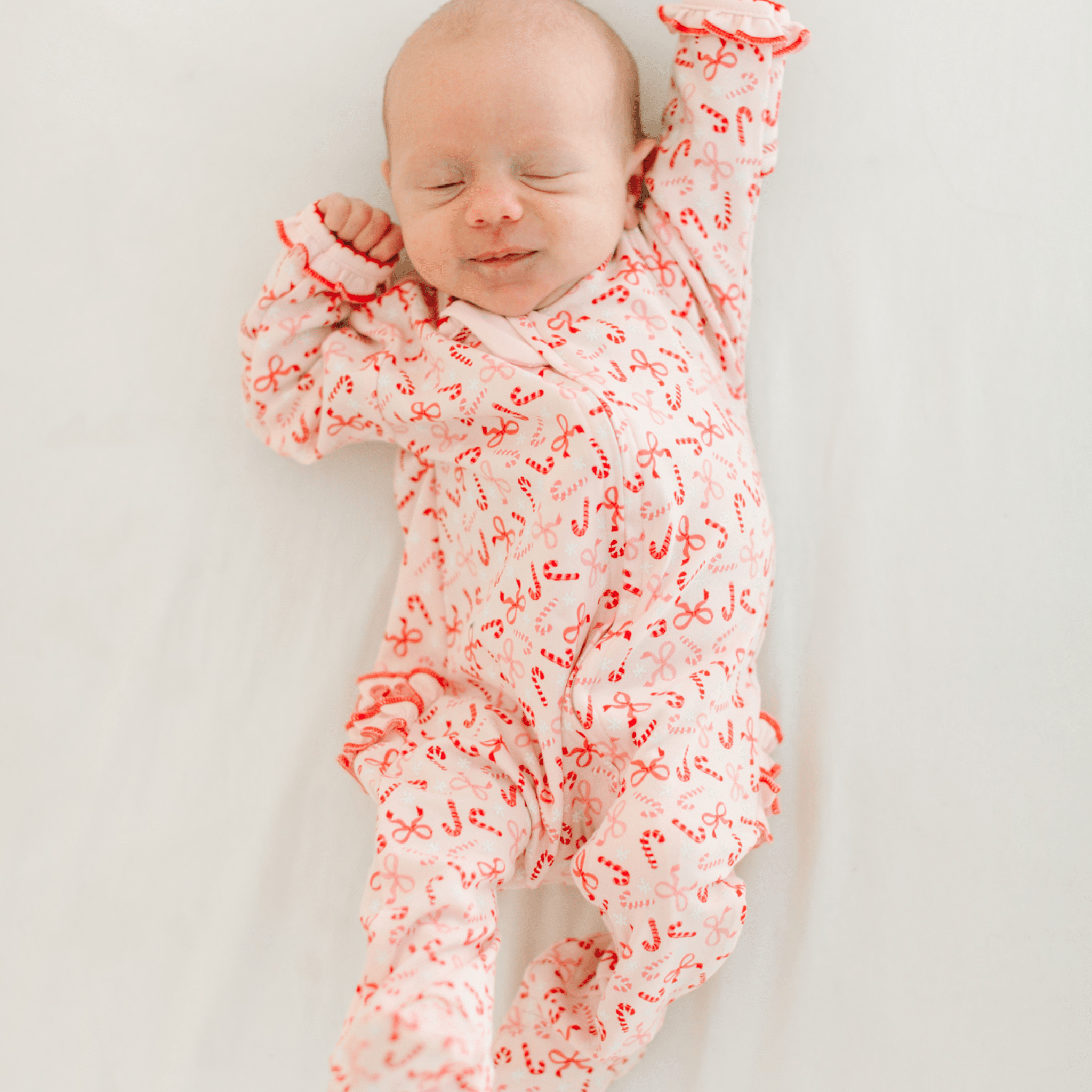 Candy Cane Lane Print Ruffle Zip Footie: 12 Months Magnolia BabyTAYLOR + MAX