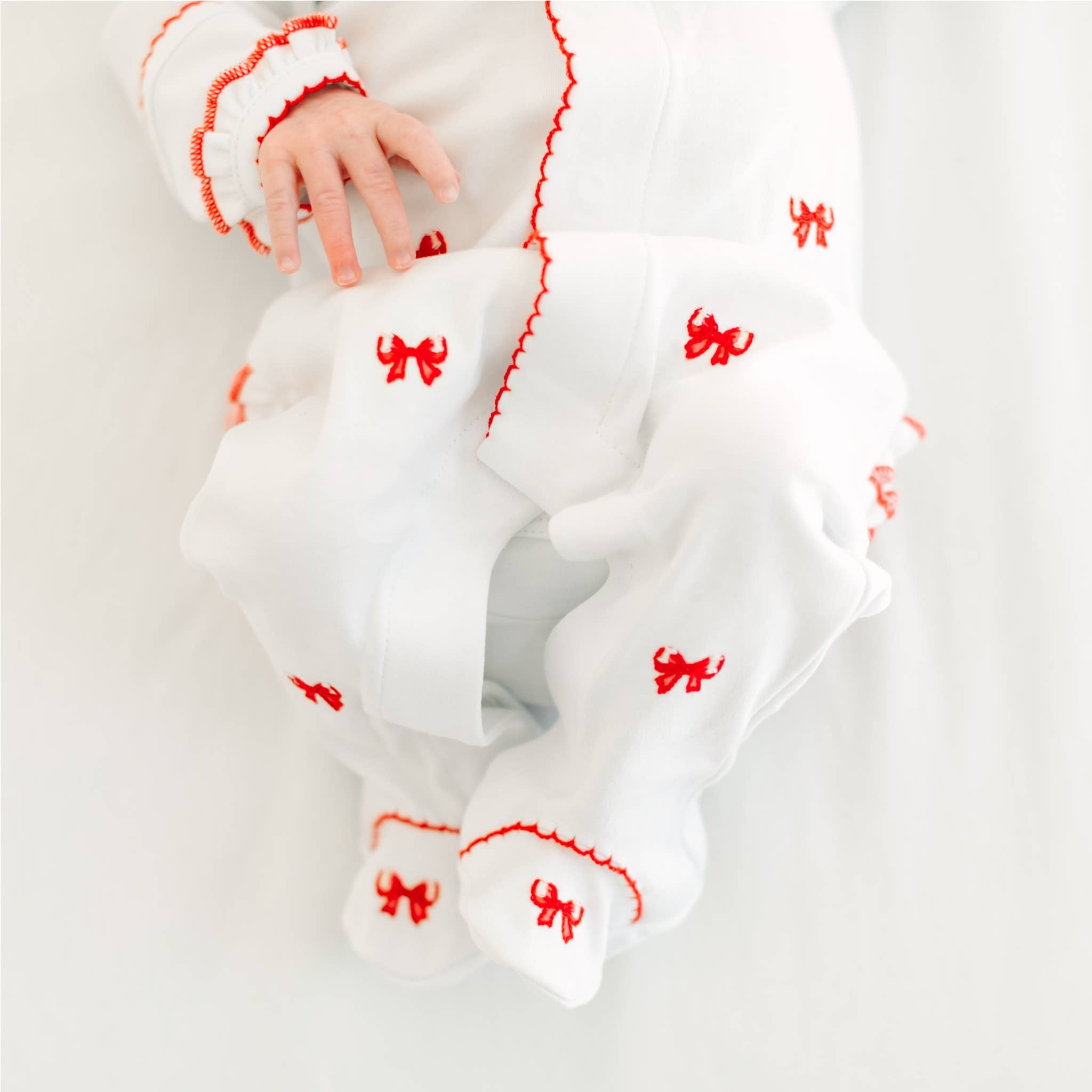 Scarlett Bows Scattered Ruffle Footie: 3 Months Magnolia BabyTAYLOR + MAX