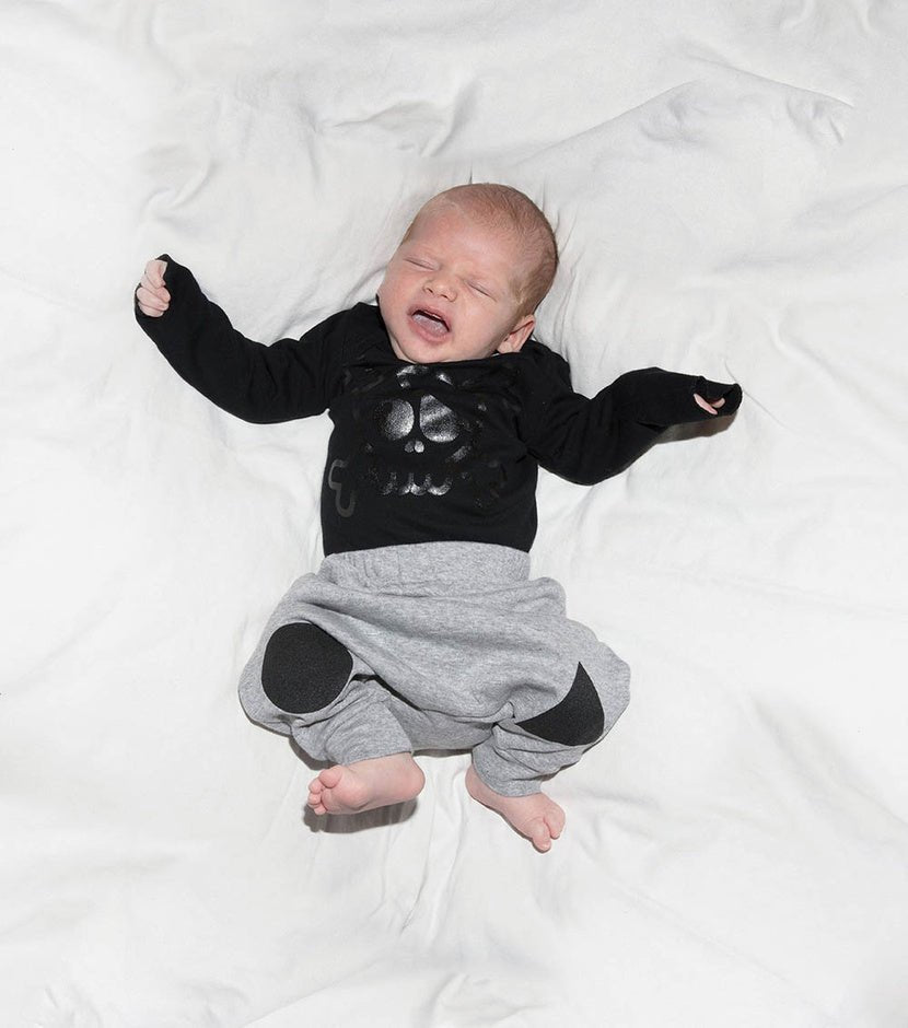 NUNUNU Skull Onesie | Black onesieNUNUNUTAYLOR + MAX