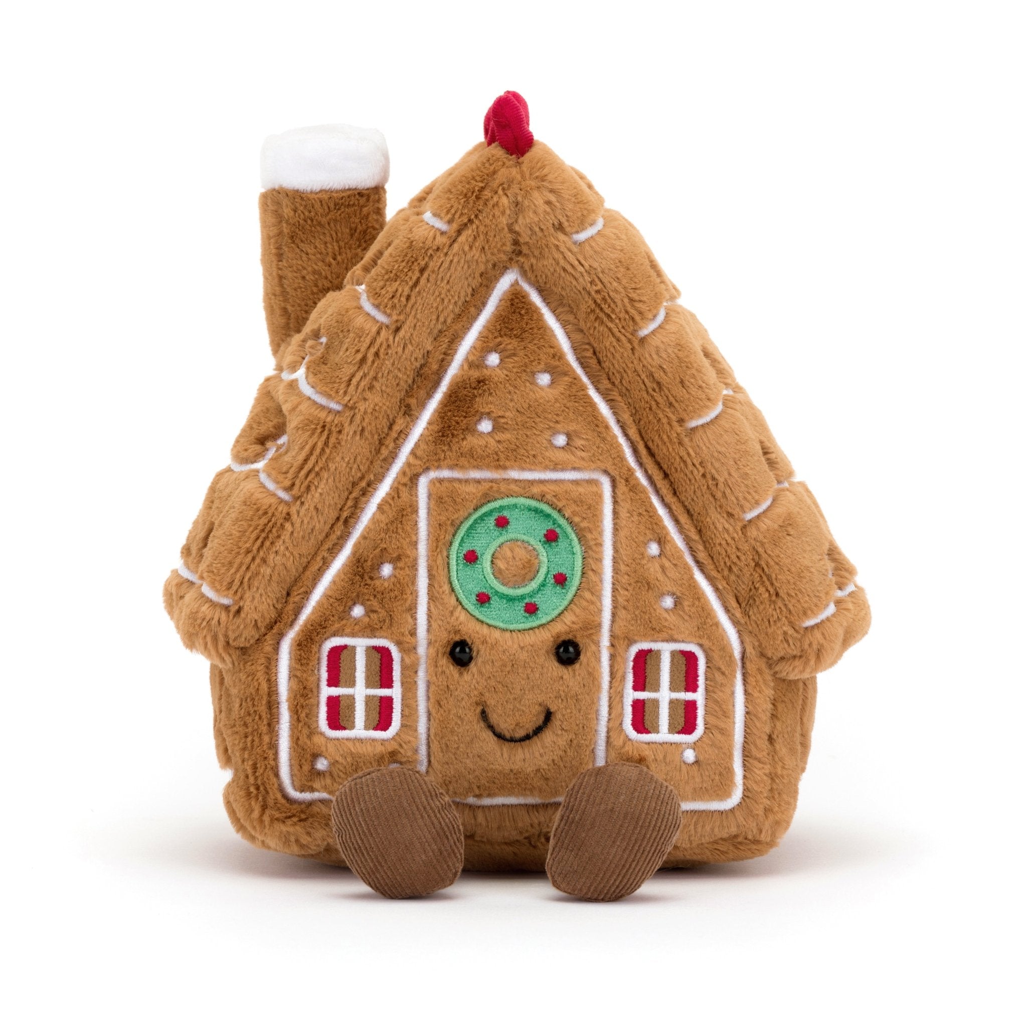 Amuseables Gingerbread House - TAYLOR + MAXJellycat - A smiling brown, stuffed gingerbread house with brown legs.