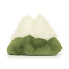 Amuseables Mountain - TAYLOR + MAX Jellycat - A smiling, green, snow capped, mountain shaped stuffed animal with brown feet, with its back facing the camera