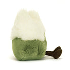 Amuseables Mountain - TAYLOR + MAX Jellycat - A smiling, green, snow capped, mountain shaped stuffed animal with brown feet, turned to the side