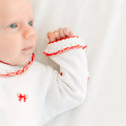 Scarlett Bows Scattered Ruffle Footie: Newborn Magnolia BabyTAYLOR + MAX